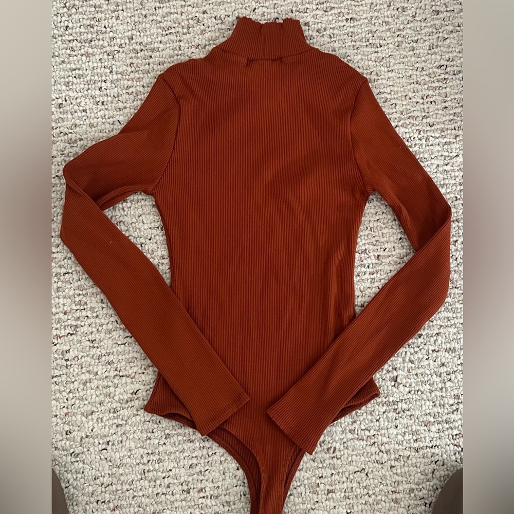 Lulu's Dark Orange Ribbed Mock Tuetleneck Long Sleeve Bodysuit